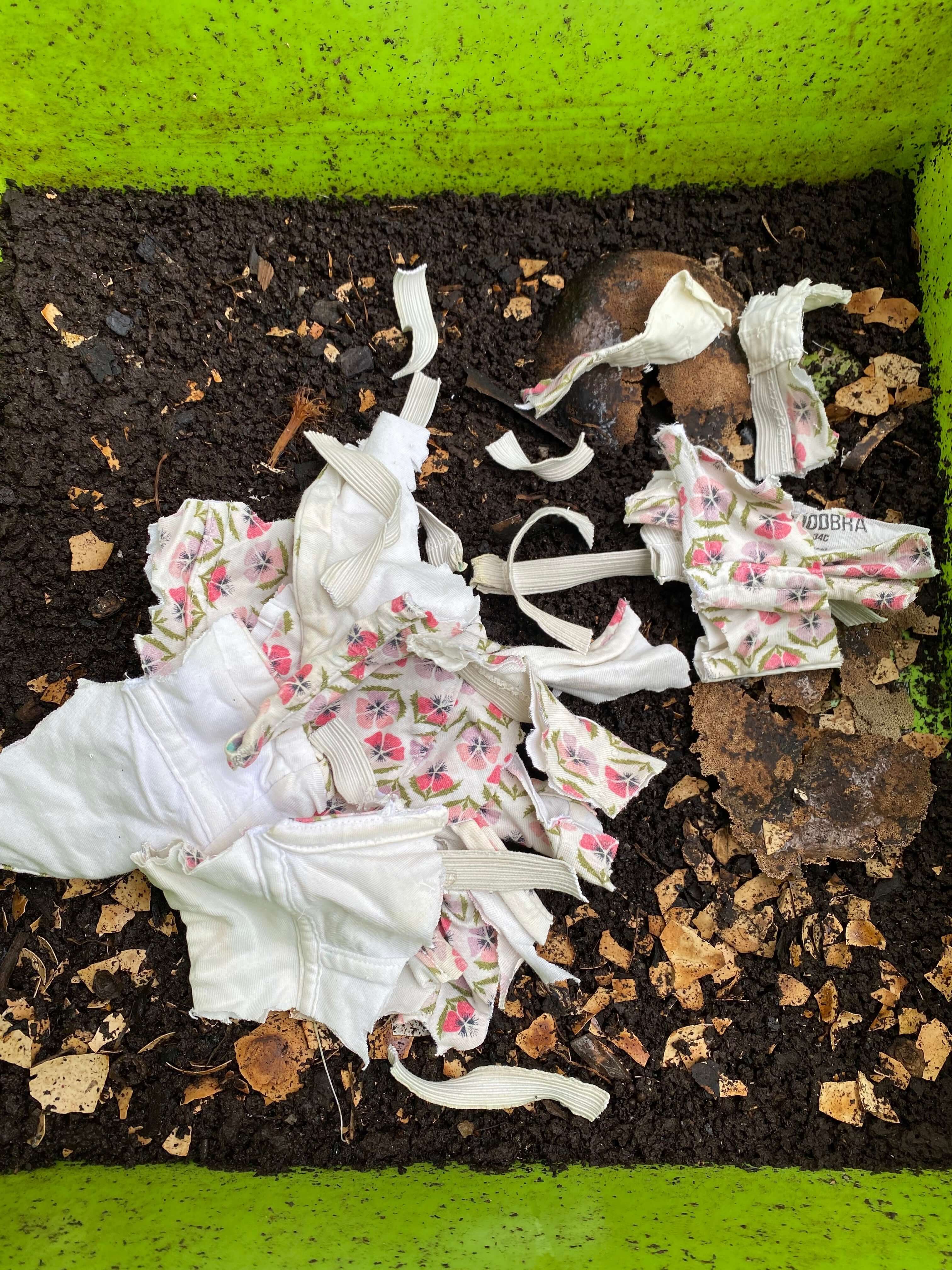 bras being broken down in compost bins