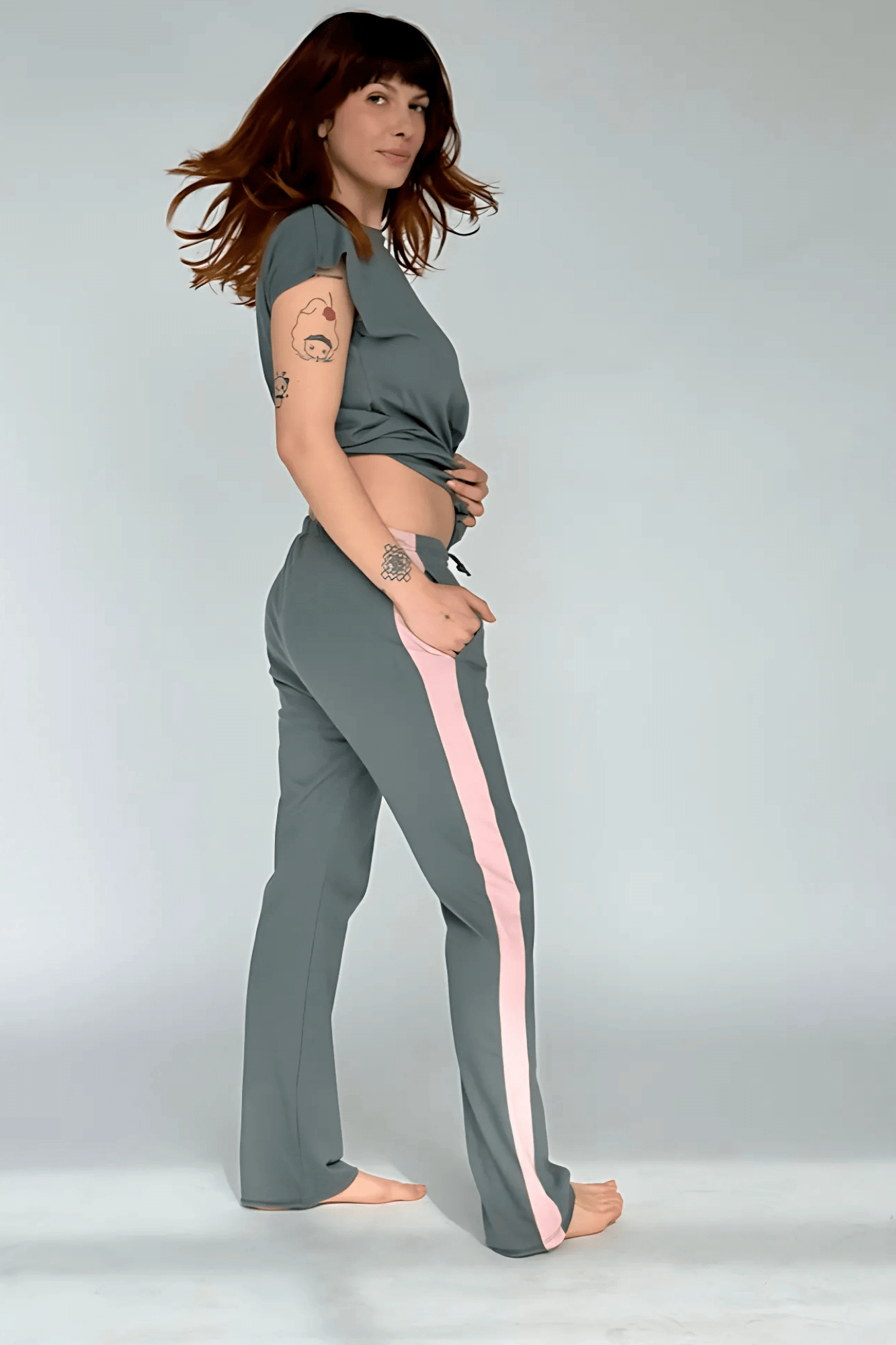 Go-Slower pants and tee in grey, side view on model