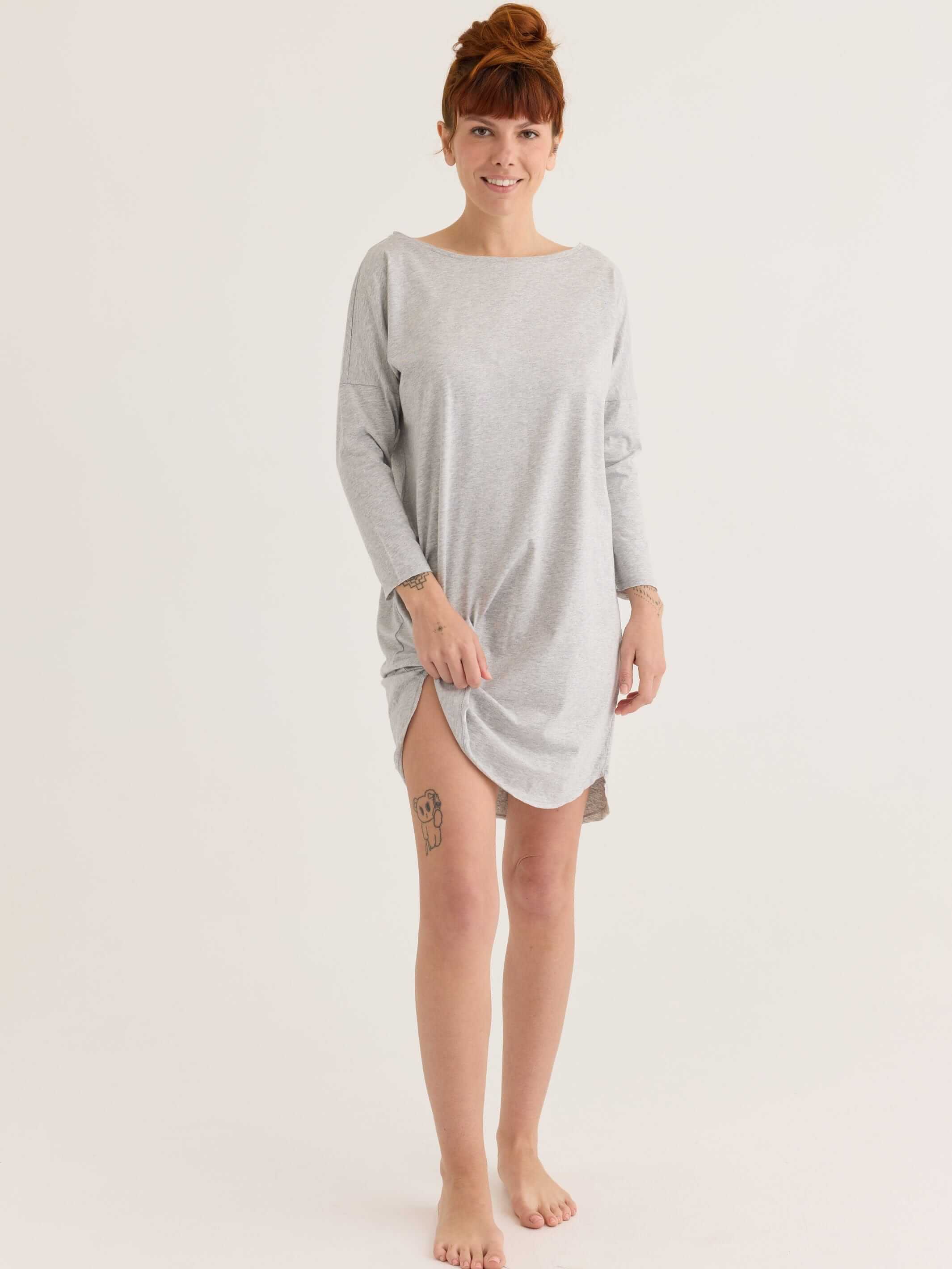 Long sleeve tee dress in grey, worn by a model