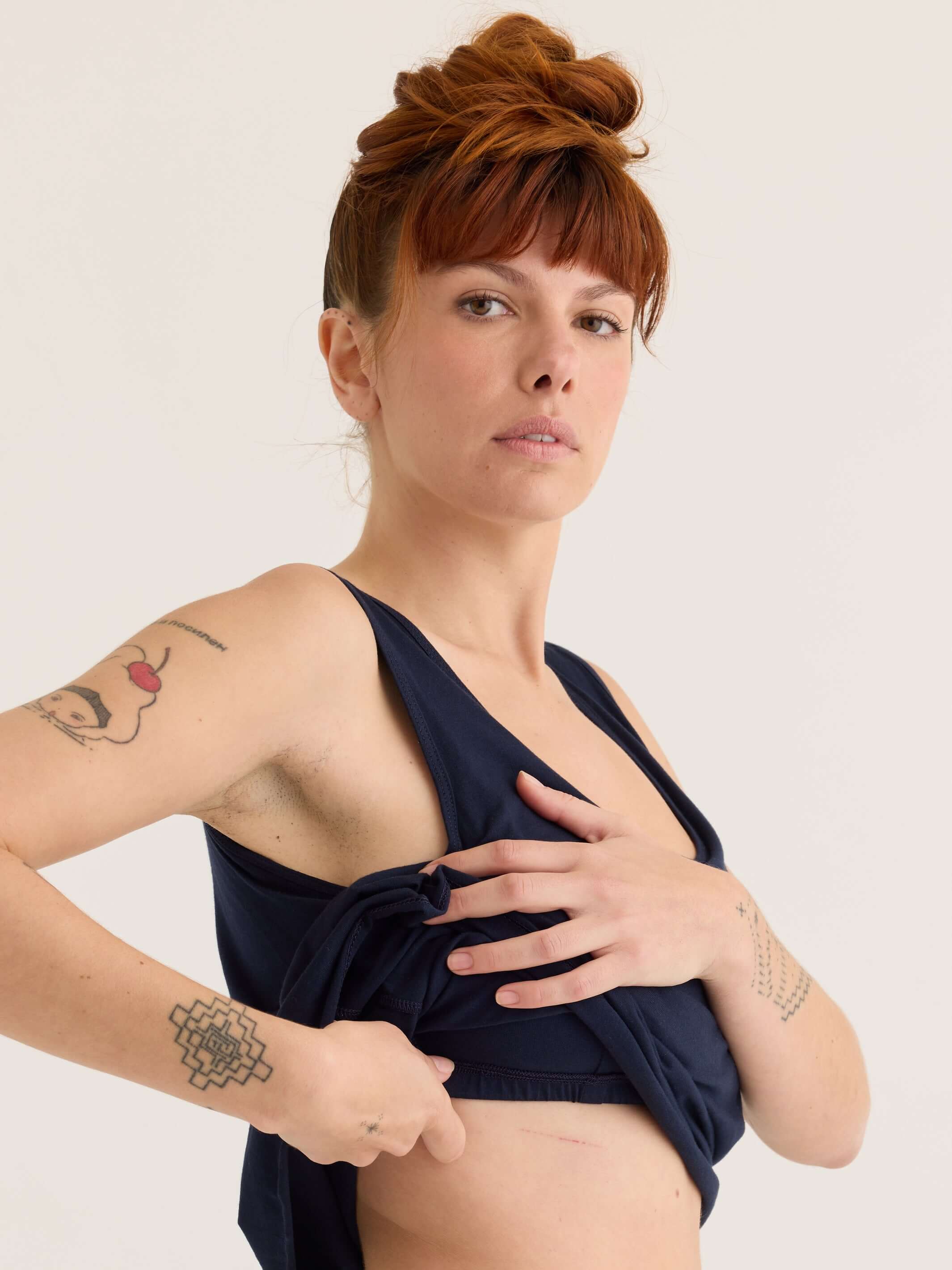 organic cotton shelf singlet in navy, side view