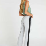 woman wearing organic cotton bra singlet and womens long cotton pants