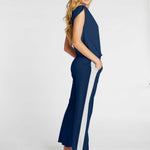 woman wearing navy womens organic cotton t shirt and womens long cotton pants