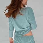Sleepwear top and shorts in sage, back view on model