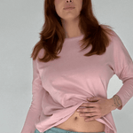 Long sleeve tee in peach, front view on model