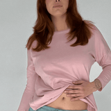 Long sleeve tee in peach, front view on model