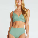 woman wearing sage green bra and matching high waist briefs in organic cotton