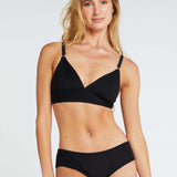 woman wearing a black bra and boy leg briefs both made from tencel
