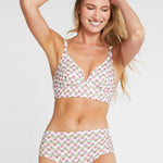 woman wearing floral print bra and high waisted briefs in Liberty Fabric pansy print